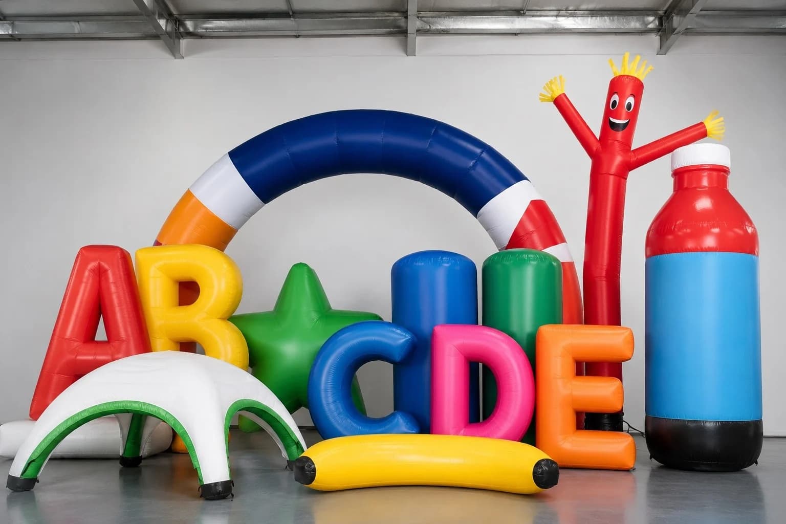 Range of custom advertising inflatables: letters, arches, air dancers, replicas