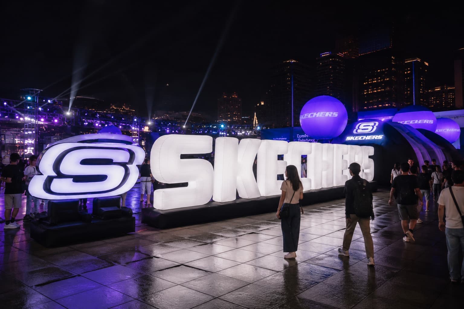 Waterproof LED inflatable letters and inflatable logo sign at a night outdoor advertising event