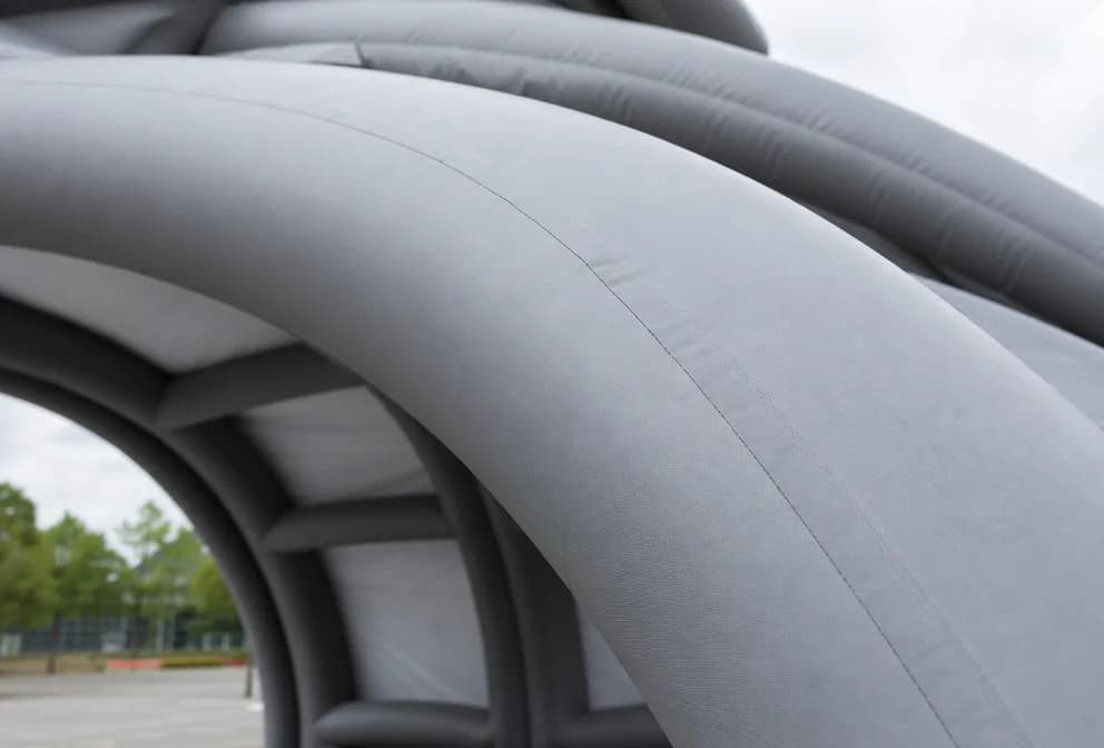 Close view of the reinforced inflatable frame on a stage tent