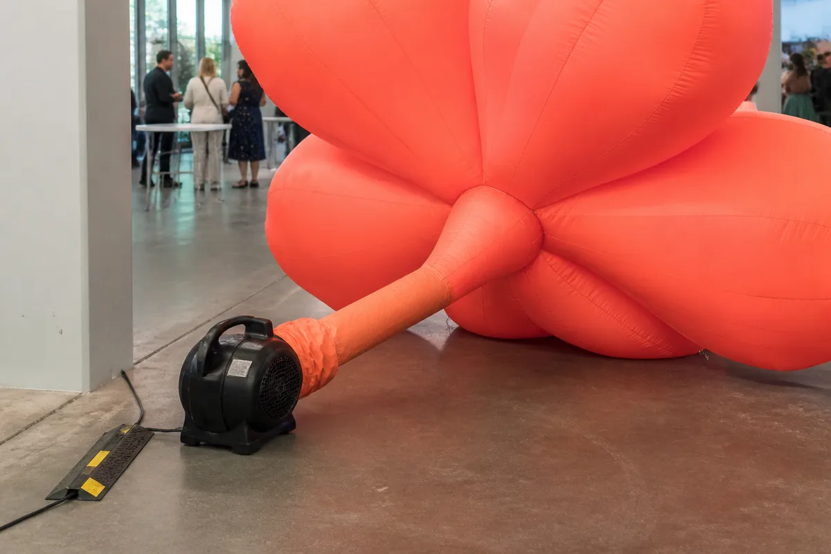 Inflatable display installation planning with floor placement and access considerations