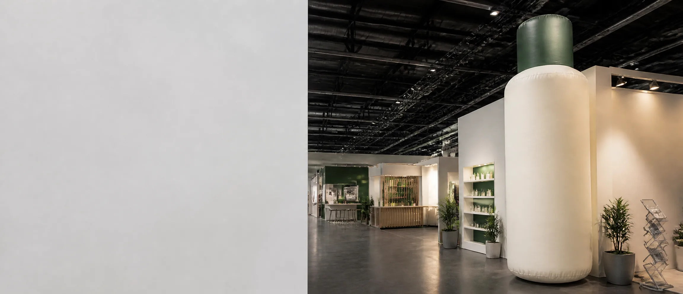 Giant skincare bottle inflatable replica in a modern exhibition booth
