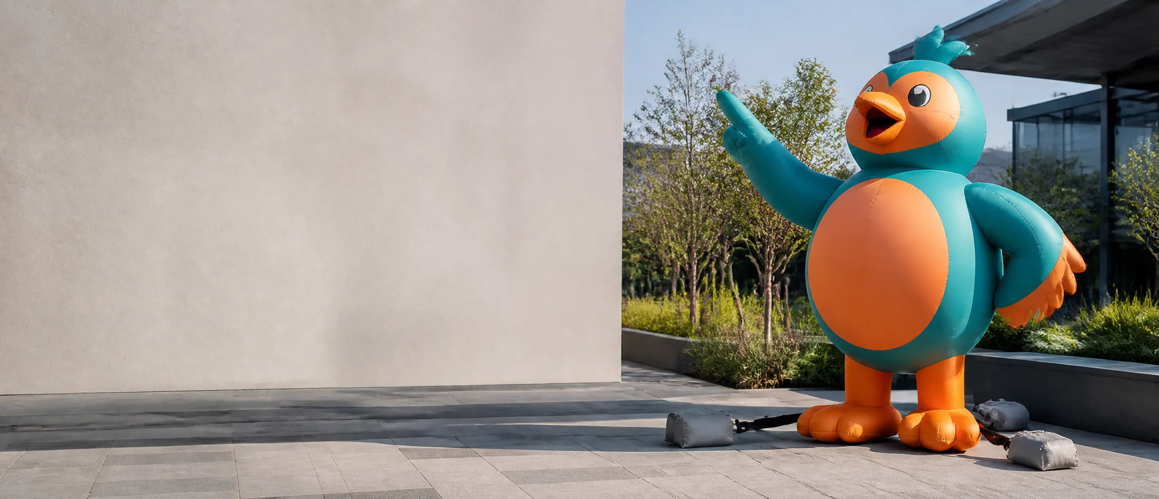 Original bird mascot inflatable installation in a commercial event area